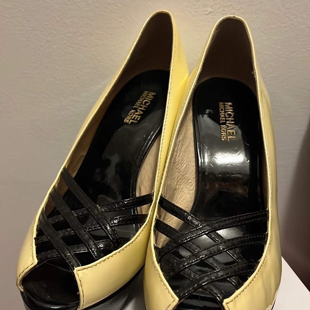 Cream in color, hardly worn. Has no box. Has some marks on it from moving things
